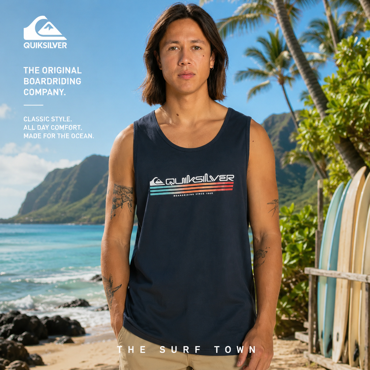 Camiseta de tirantes Quiksilver Omni Fills Tank Navy en fotografía editorial propia de THE SURF TOWN en playa tropical de Hawái con luz natural diurna y estilo surf lifestyle premium