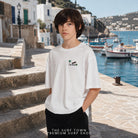 Camiseta Volcom Ozzy I White para niño en editorial mediterránea premium de THE SURF TOWN