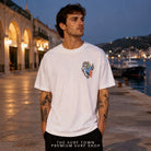 Camiseta Volcom SK8 Break White en editorial portuaria premium de THE SURF TOWN