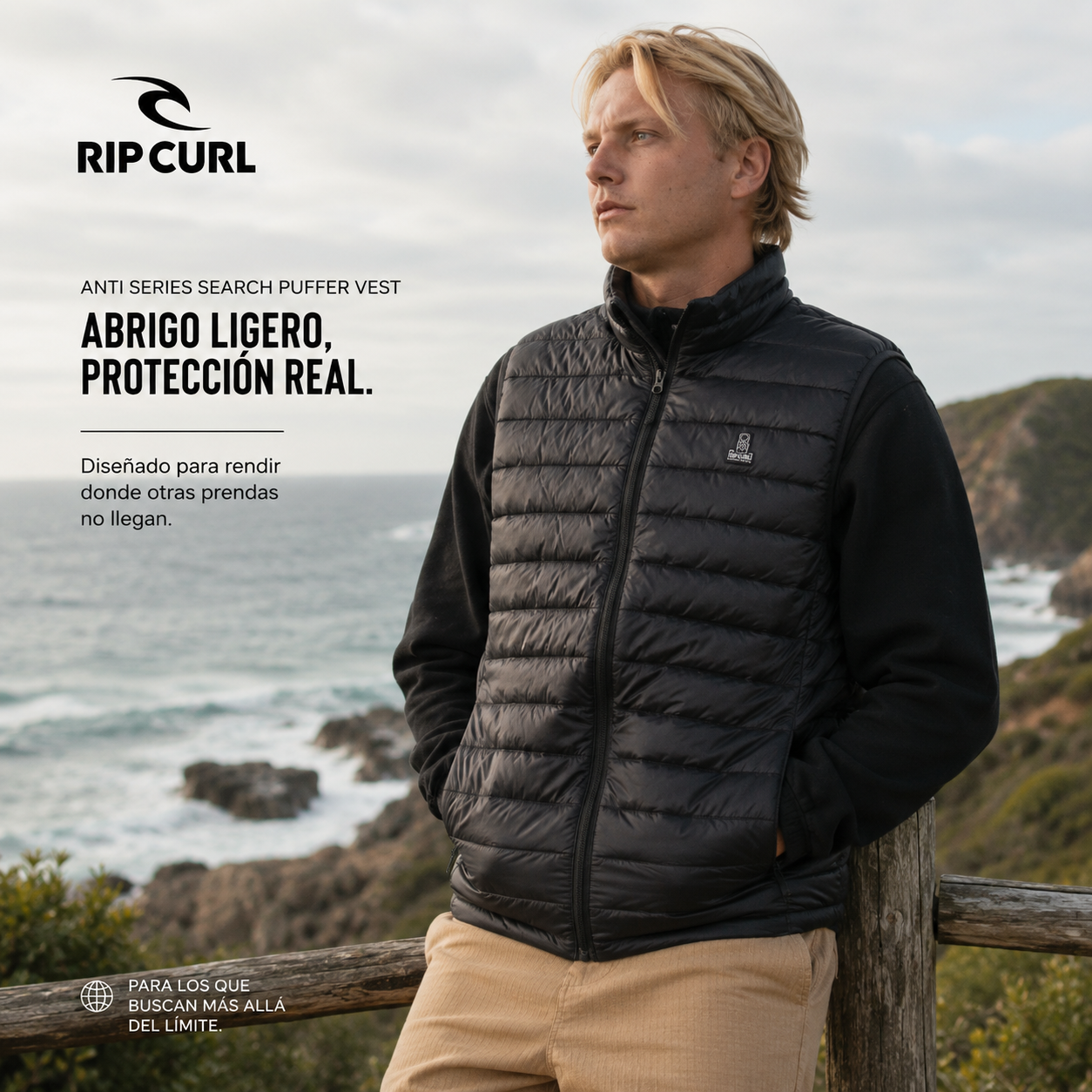 Chaleco Rip Curl Anti Series Search Puffer Vest Black para hombre en acantilado costero con ambiente outdoor premium