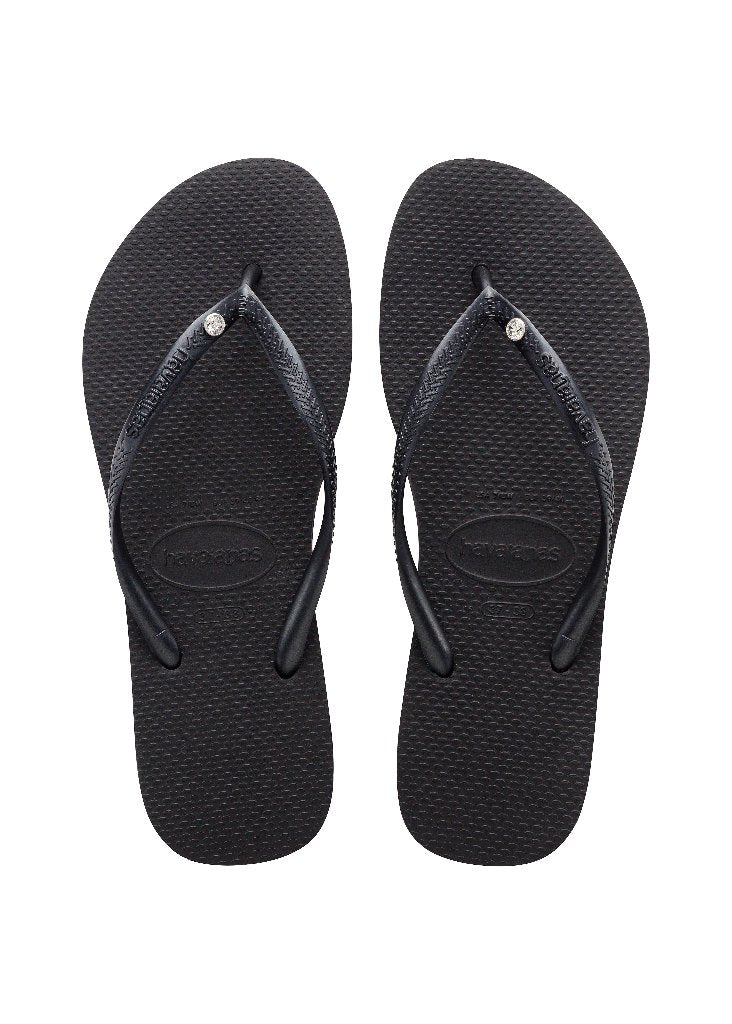 Chanclas Havaianas Slim Crystal Black mujer negras con tiras finas y detalle de cristal sobre suela cómoda de goma ideales para verano, playa y piscina