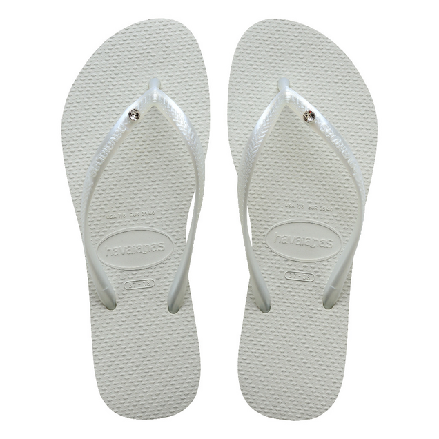Chanclas Havaianas Slim Crystal White mujer blancas con tiras finas y detalle de cristal sobre suela cómoda de goma ideales para verano, playa y piscina