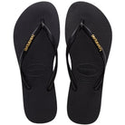 Chanclas Havaianas Slim Logo Metallic Black Gold mujer negras con logo metálico dorado para verano y playa