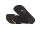 Chanclas Havaianas Top Logo Metallic Black negras con logo metálico dorado en las tiras y suela cómoda de goma para verano, playa y piscina