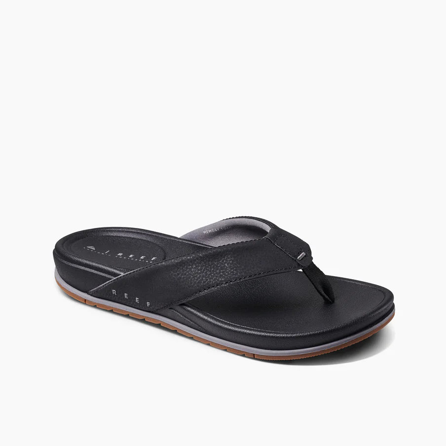Chanclas REEF Cushion Bonzer Black Gum para hombre con plantilla Cushion cómoda color negro y suela caramelo estilo surf verano