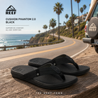 Chanclas Reef Cushion Phantom 2.0 Black para hombre en fotografía lifestyle premium sobre carretera coastal California con estilo surf y confort diario