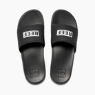 Chanclas de pala REEF One Slide Black White con suela EVA ligera y logo REEF blanco estilo surf verano