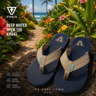 Fotografía propia de THE SURF TOWN de las chanclas Vissla Deep Water Open Toe Khaki para hombre en un jardín tropical de Hawái con flores exóticas, senderos naturales y ambiente surf lifestyle premium.