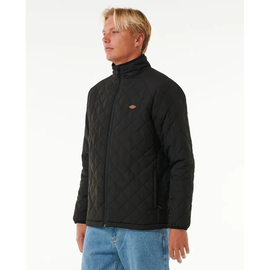 Chaqueta RIP CURL Classic Surf Black hombre acolchada negra con cremallera estilo surf urbano