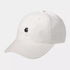 Gorra Carhartt WIP Harlem Logo Cap Wax blanco roto de pana con logo negro bordado y cierre ajustable metálico