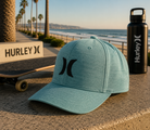 Gorra Hurley H2O Dri One Only Aurora Green en paseo marítimo surf lifestyle premium Costa del Sol