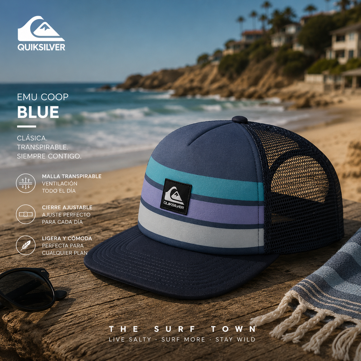 Gorra Quiksilver Emu Coop Blue Trucker en fotografía editorial propia de THE SURF TOWN sobre una playa mediterránea de verano