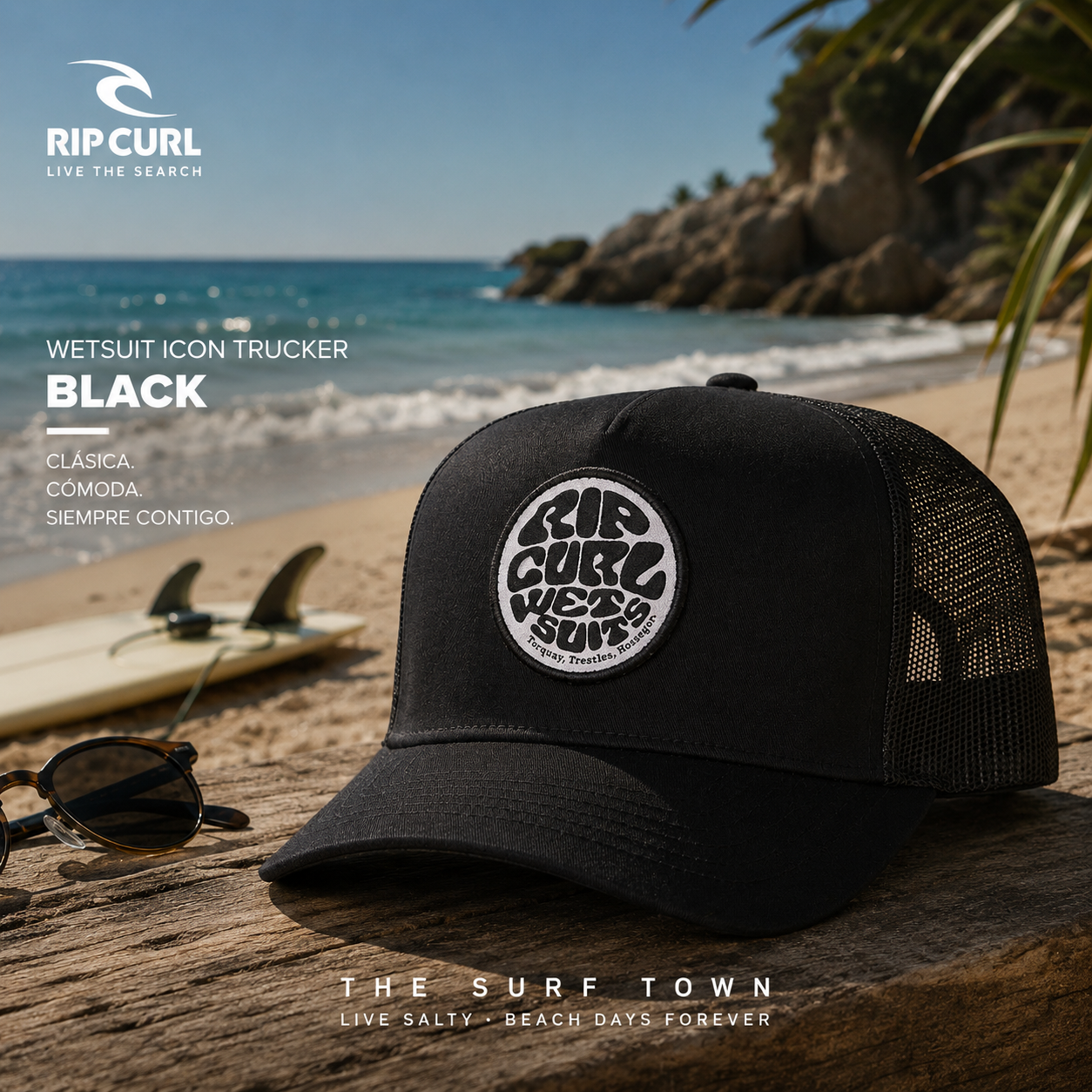 Gorra Rip Curl Wetsuit Icon Trucker Black en fotografía editorial propia de THE SURF TOWN sobre una playa mediterránea de verano