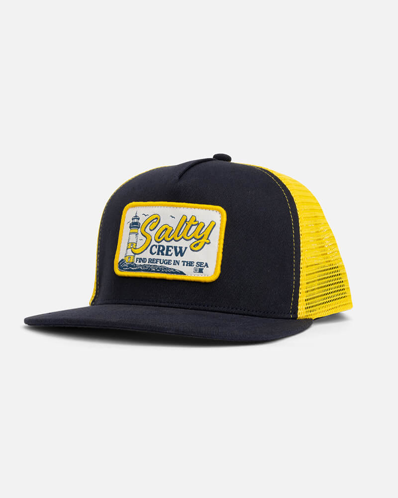 Gorra Salty Crew Ashore Trucker Navy Gold estilo trucker con rejilla y parche frontal