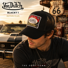 Gorra Von Dutch Blacky 1 Trucker Cap negra con parche Motorcycles bordado y rejilla trasera en fotografía editorial propia de THE SURF TOWN inspirada en la cultura motera americana, Route 66 y el estilo trucker vintage de California.