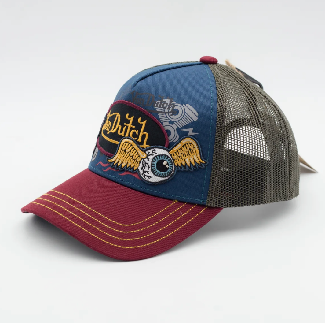 Gorra Von Dutch Patches 20 con visera burdeos y copa azul marino con parches de la marca y parte trasera de rejilla de color gris