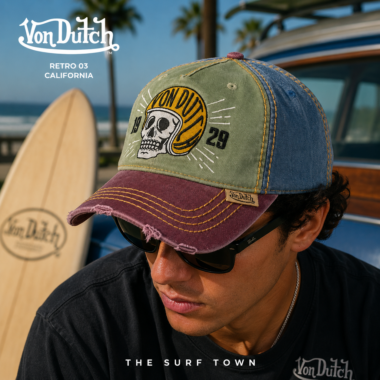 Gorra Von Dutch Retro 03 multicolor con calavera y casco vintage bordados en fotografía editorial propia de THE SURF TOWN inspirada en el surf lifestyle californiano y la cultura motera retro americana.