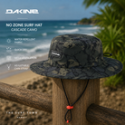 Gorro Dakine No Zone Surf Hat Cascade Camo en fotografía editorial propia de THE SURF TOWN frente al océano con protección solar integral, ala ancha y diseño técnico para surf y actividades acuáticas