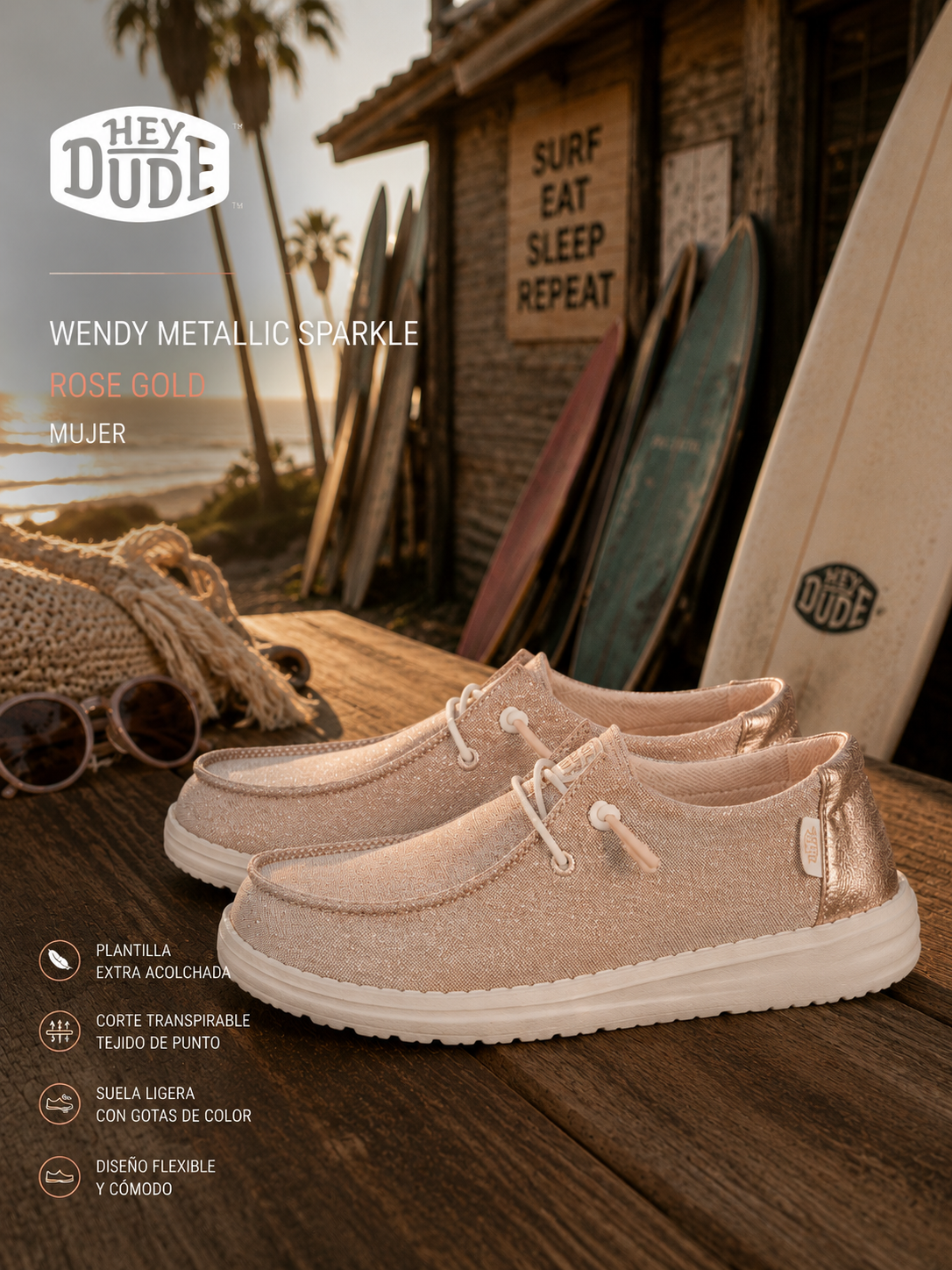 Zapatillas Hey Dude Wendy Metallic Sparkle Rose Gold para mujer en escenario surf lifestyle premium con estética coastal cinema y luz dorada editorial
