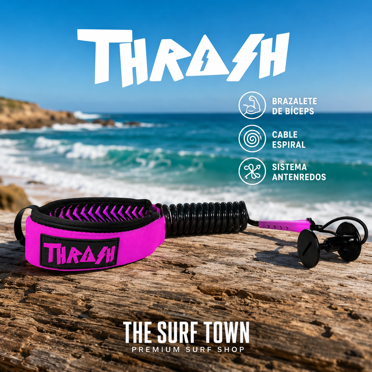 Invento THRASH V-Grip Bíceps Black/Pink sobre madera frente a una playa con olas, imagen editorial propia de THE SURF TOWN