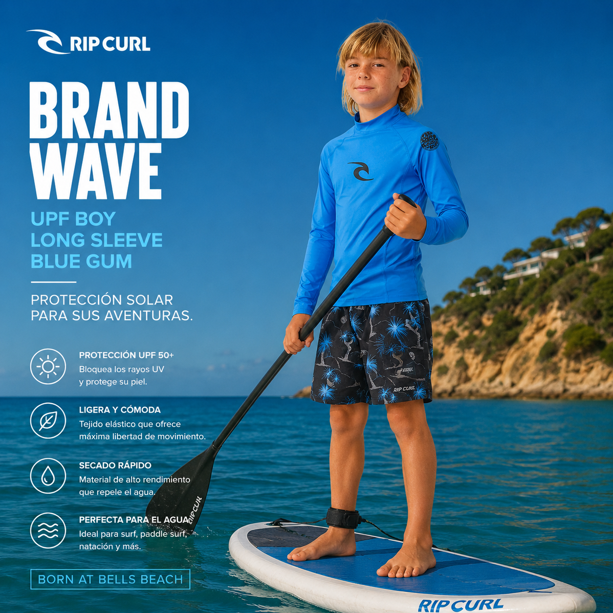 Licra Rip Curl Brand Wave UPF Boy Long Sleeve Blue Gum para niño practicando paddle surf con protección solar UPF 50