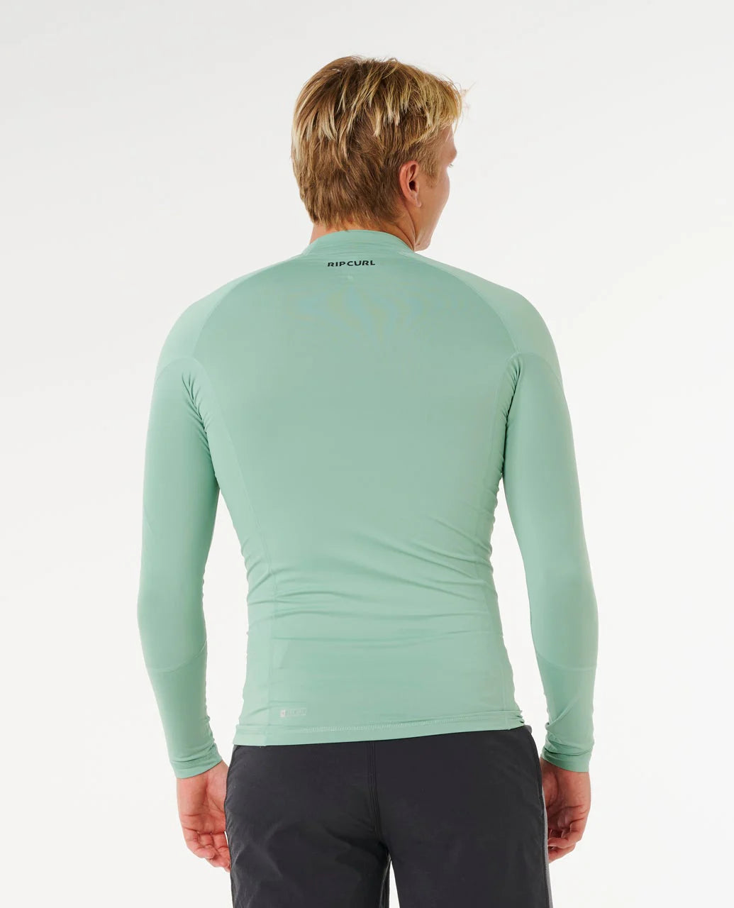 Licra Rip Curl Waves UPF50 Performance Aloe LS para hombre en color verde aloe con protección solar UPF50+ para surf y actividades acuáticas