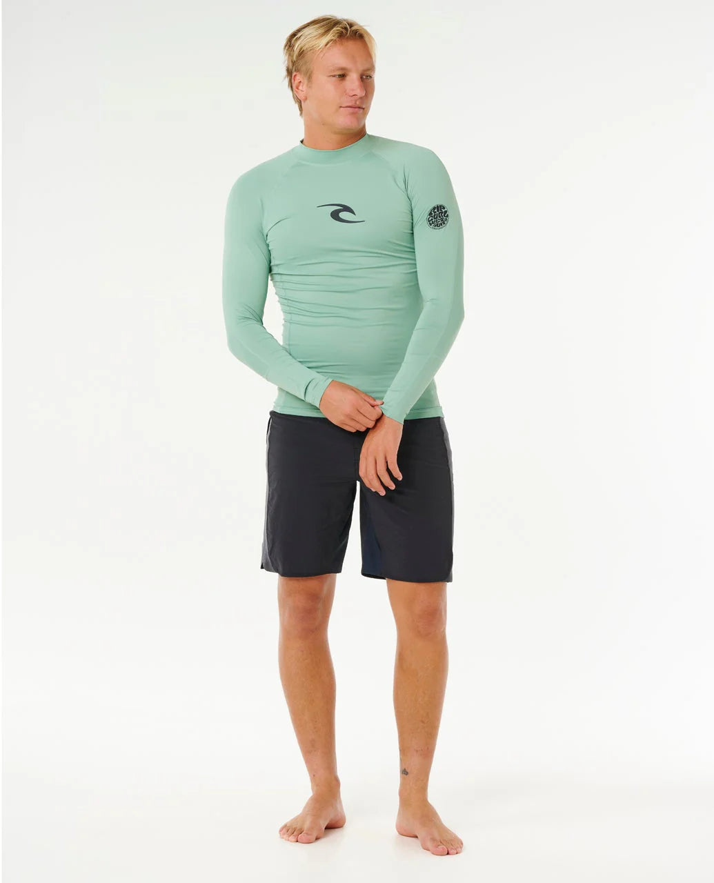 Licra Rip Curl Waves UPF50 Performance Aloe LS para hombre en color verde aloe con protección solar UPF50+ para surf y actividades acuáticas