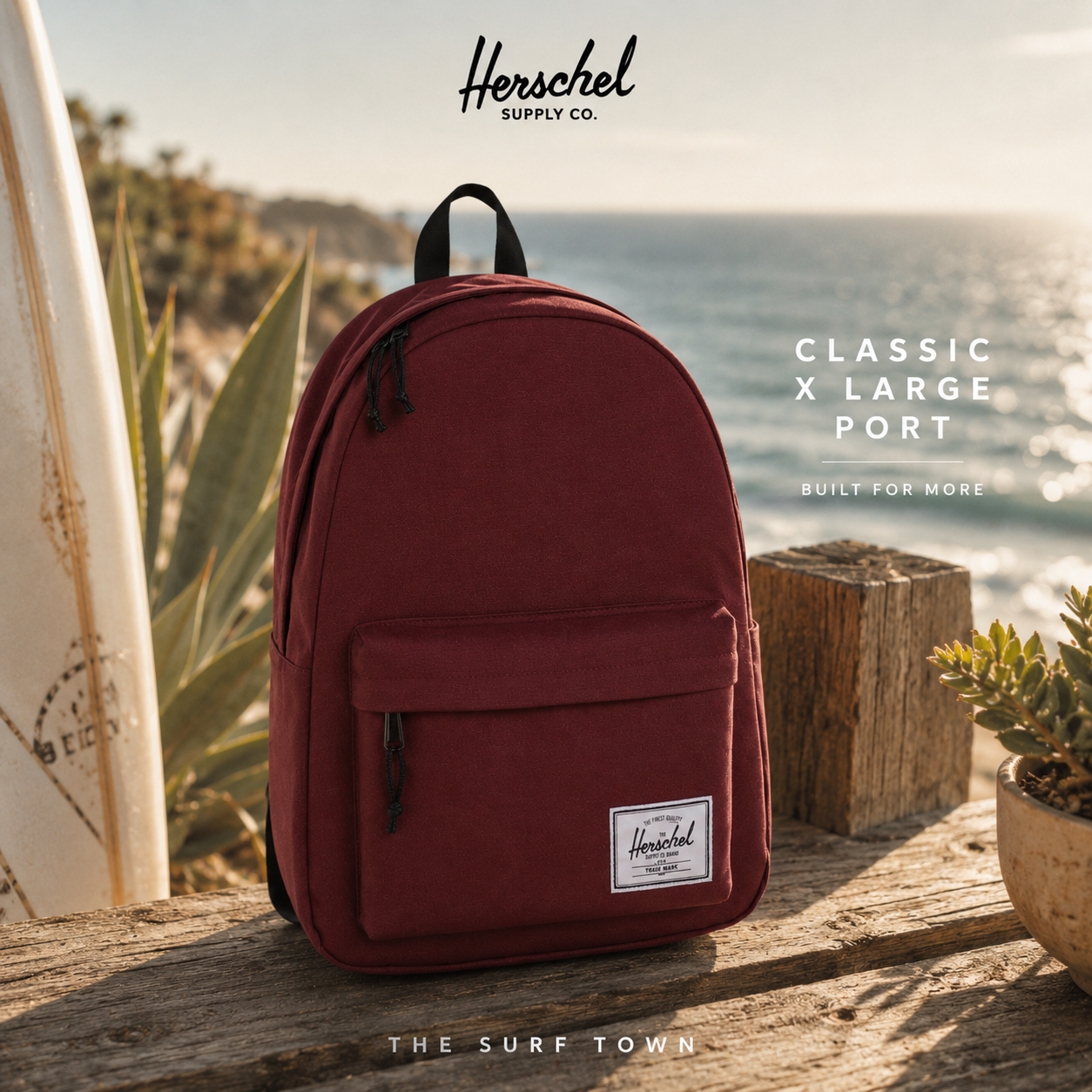 Mochila Herschel Classic X Large Port granate en fotografía editorial propia de THE SURF TOWN con escenario coastal premium y estilo travel lifestyle