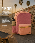 Mochila Rip Curl Icons 18L Cord Lilac en skatepark sunset con estética surf skate lifestyle premium