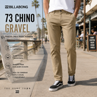 Pantalones Billabong 73 Chino Gravel en fotografía editorial propia de THE SURF TOWN, pantalón chino beige para hombre con estilo surf urbano en paseo marítimo premium