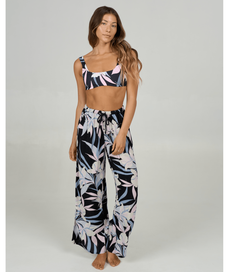 Pantalones Salty Crew Dreamland Beach Pant Black para mujer con estampado tropical, corte amplio y estilo costero para verano