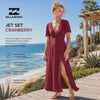 video editorial propio de the surf town de mujer llevando Vestido Billabong Jet Set Cranberry en pasarela de madera hacia la playa