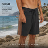 modelo de surf vistiendo un Bañador Hurley Phantom Eco Hybrid Panel Htr Tan en una sesion de video promocional propio de the surf town en la playa