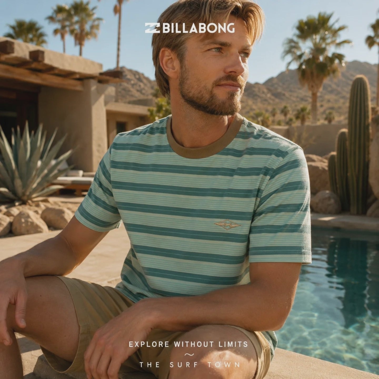 modelo vistiendo una Camiseta Billabong Baxter Sea Green en un video promocional propio de the surf town en la piscina de un resort de lujo mediterraneo