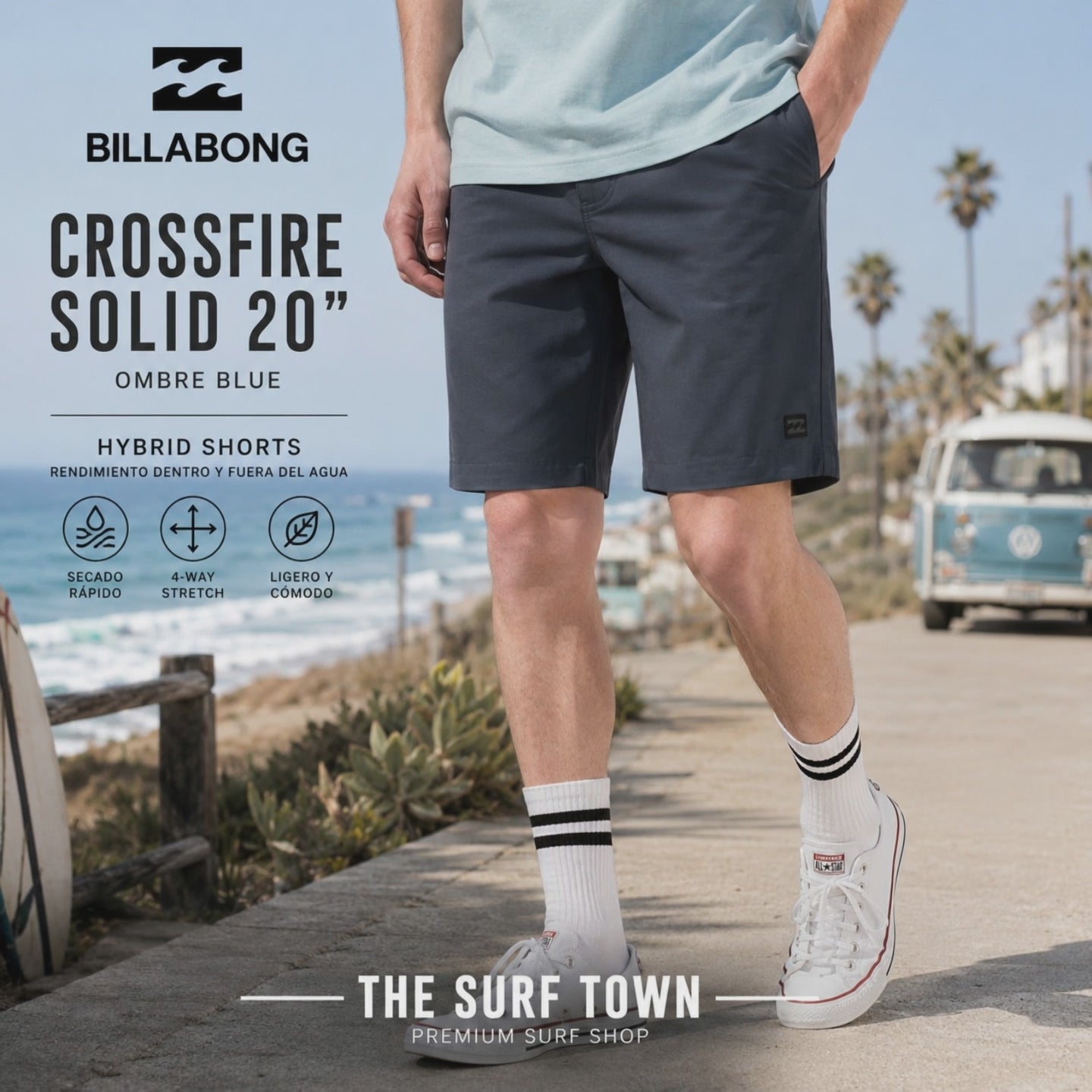 surfero llevando unas Bermudas Billabong Hibrido Crossfire Solid 20 Ombre Blue durante un video propio promocional de the surf town en un paseo junto al mar