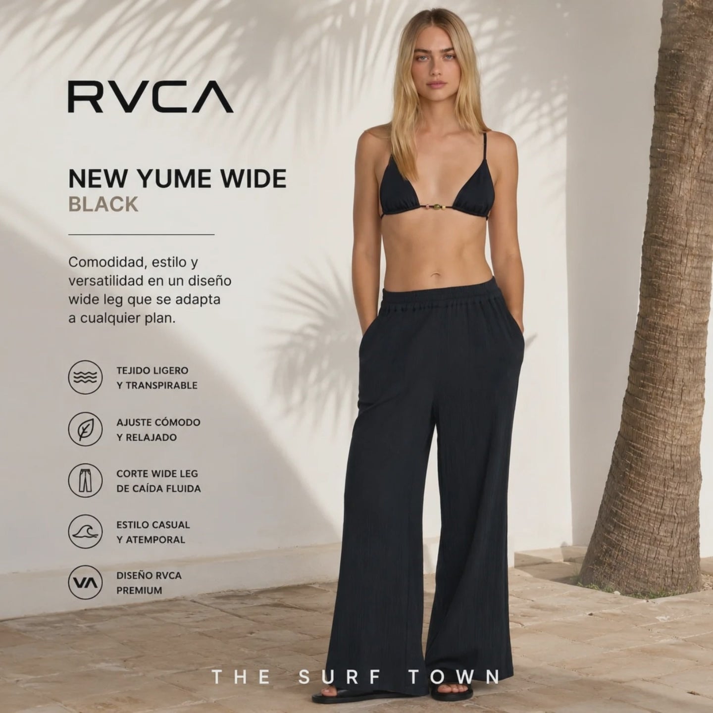 video editorial propio de the surf town de modelo llevando unos pantalones RVCA new yume wide black en el exterior de una villa con una palmera de fondo y textos editoriales premium