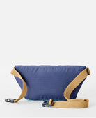 Riñonera Rip Curl Rip Waist Bag Multicolor en tonos azul y turquesa inspirados en el océano para viajes, playa y surf lifestyle