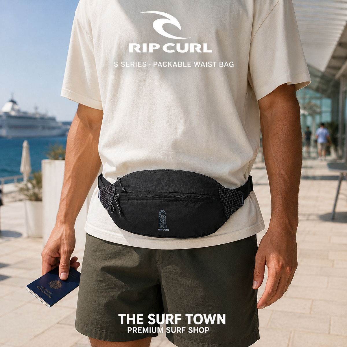 Riñonera plegable Rip Curl S Series Black para viaje, llevada cómodamente a la cintura junto al mar, imagen editorial propia de THE SURF TOWN.