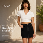 Falda Rvca Spring Shift Black de mujer en escena editorial lifestyle premium con luz natural y estética surfwear femenina