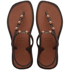 Sandalias Havaianas Flash Fusion Brown mujer con tiras finas marrones, detalles metálicos dorados y suela de goma cómoda para verano
