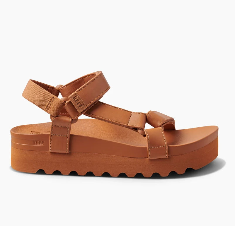 Sandalias REEF Cushion Rem Hi Cognac para mujer con plataforma cómoda y tiras de piel vegana color camel verano