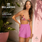 Short Billabong At Sunrise Lush Lilac en fotografía editorial propia de THE SURF TOWN con estilo surf femenino, moda de verano y look casual de playa