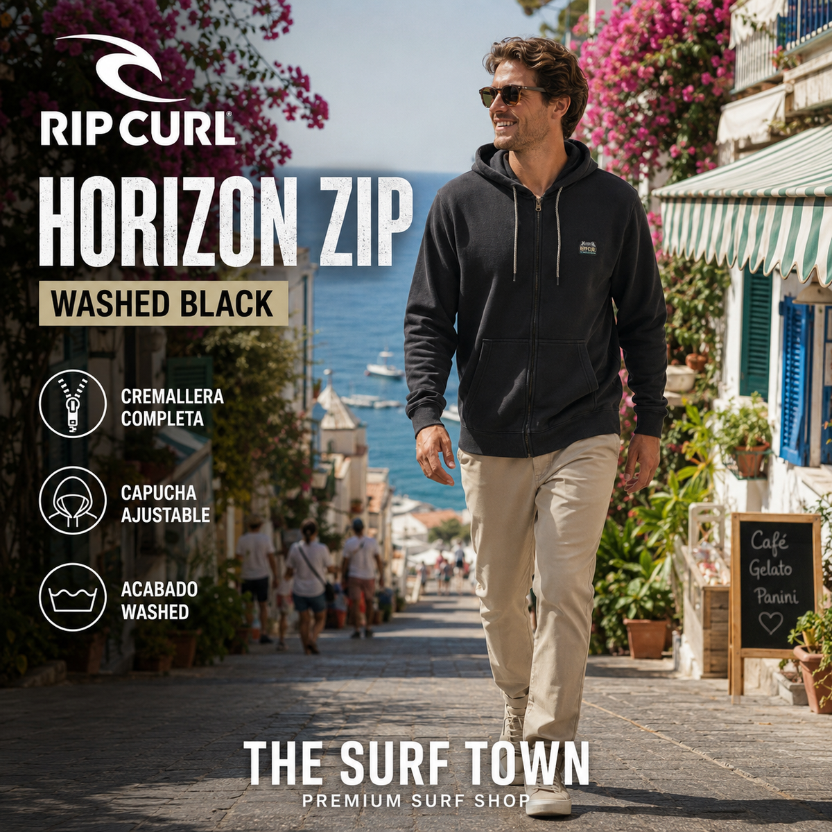 Hombre con sudadera Rip Curl Horizon Zip Washed Black en un destino costero, imagen editorial propia de THE SURF TOWN
