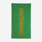 Toalla Havaianas Green Yellow Plus verde con logo amarillo de playa 100x200 cm 100% algodón