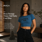 Top Rvca Strange Times Half Baby Cool Blue de mujer en interior arquitectónico japonés con estética editorial surfwear premium