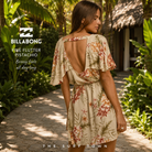 Vestido Billabong Fine Flutter Pistachio en fotografía editorial propia de THE SURF TOWN en sendero tropical de resort premium con estilo surf lifestyle femenino