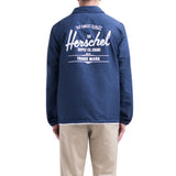 Parte de atras del Cortavientos Herschel Voyage Coach Jacket Peacoat White Classic Logo de color azul