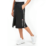 Falda Champion Taped Skirt negra con logo champion en los laterales envío gratis en 24 horas