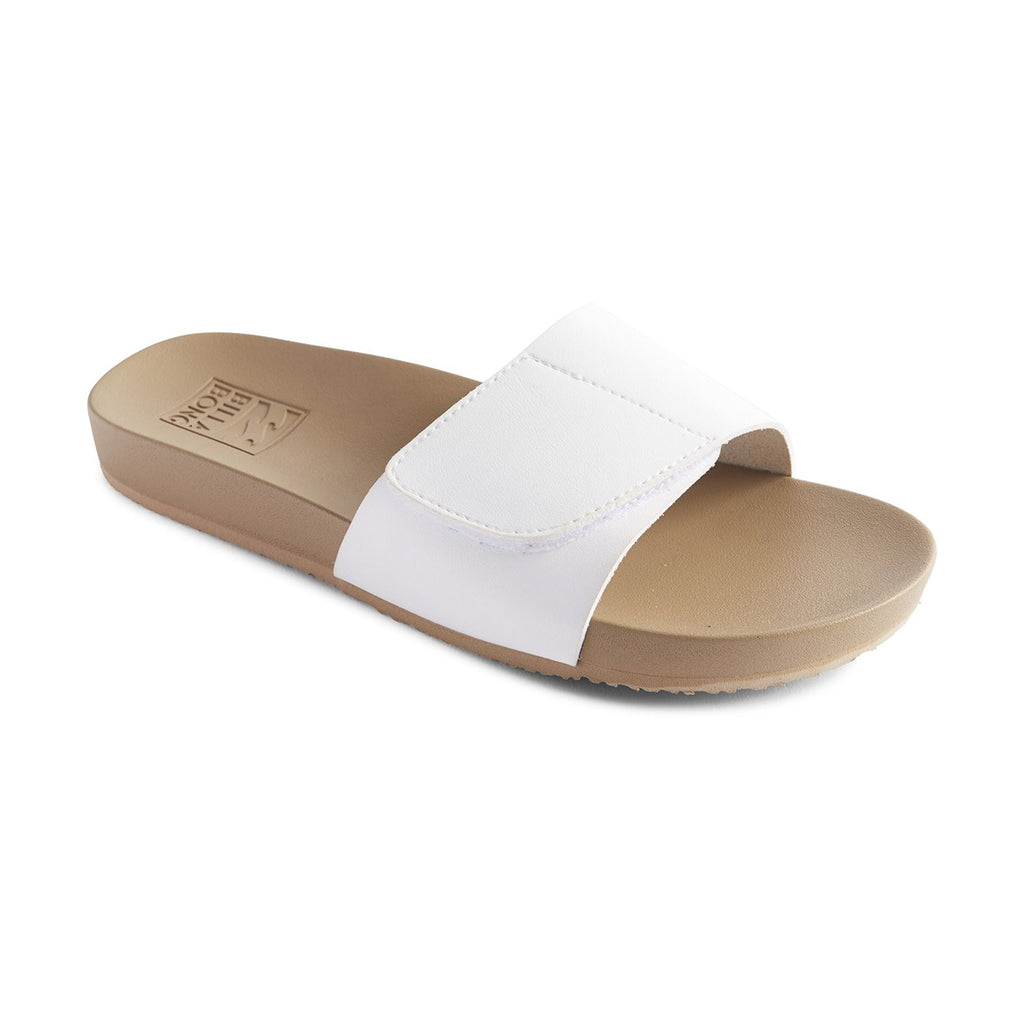 Sandalias con tira ancha en color blanca con velcro ajustable y suela gruesa ergonómica.