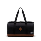 Bolso Herschel Heritage Duffle negro con base marrón y gran capacidad de 37 litros para viaje o gimnasio
